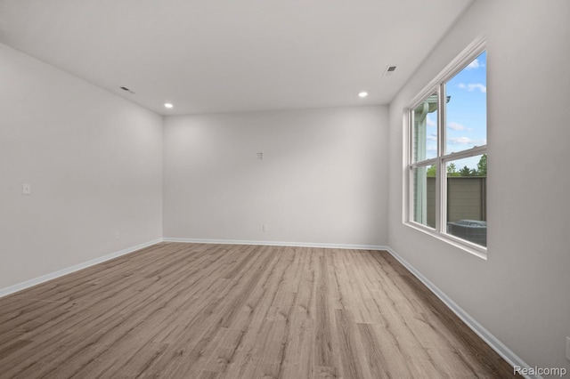 2302 Mill Ln, Saline, MI 48176 - empty room with wood finished floors, baseboards, and recessed lighting