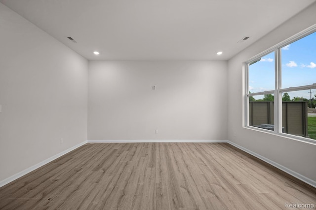 2302 Mill Ln, Saline, MI 48176 - empty room with wood finished floors, baseboards, and recessed lighting