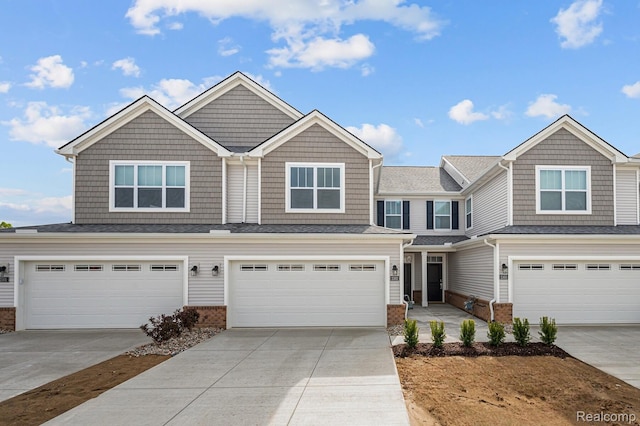 2302 Mill Ln, Saline, MI 48176 - view of front facade with an attached garage, driveway, and brick siding