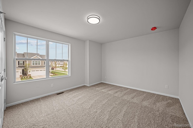 2302 Mill Ln, Saline, MI 48176 - carpeted spare room featuring baseboards