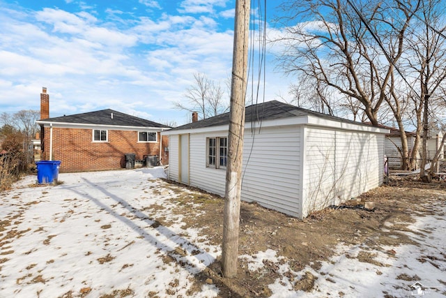 view of snow covered property