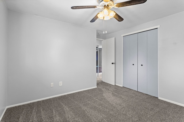 unfurnished bedroom with a closet, ceiling fan, and carpet flooring