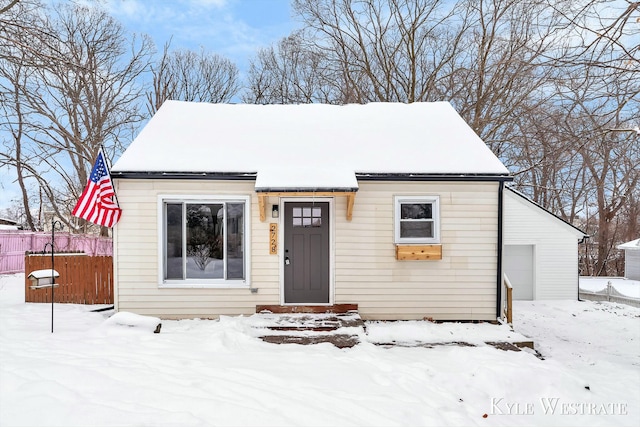 bungalow-style home featuring a garage