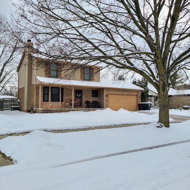 front facade with a garage