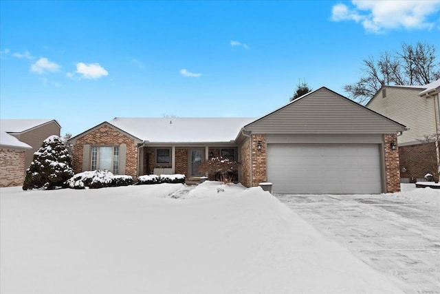 ranch-style home featuring a garage