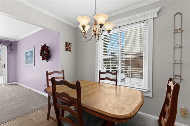 dining room with a notable chandelier, carpet floors, and ornamental molding