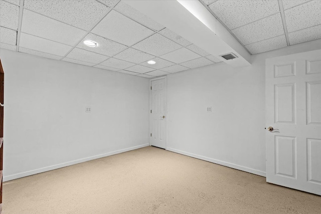 empty room with a drop ceiling