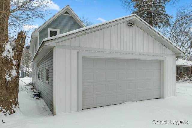 view of snow covered garage