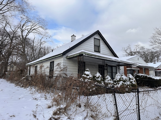 view of snow covered property