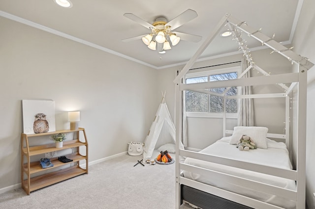 bedroom featuring ceiling fan, baseboards, carpet, and ornamental molding