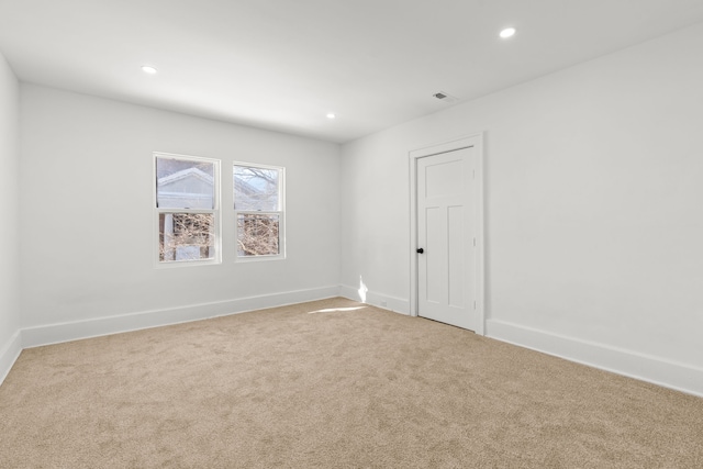 unfurnished room featuring carpet floors