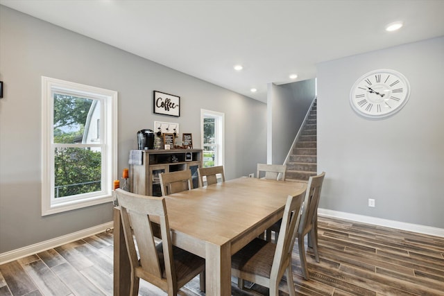 dining space featuring dark hardwood / wood-style floors