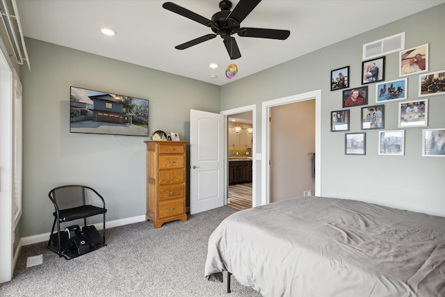 bedroom featuring ceiling fan and carpet