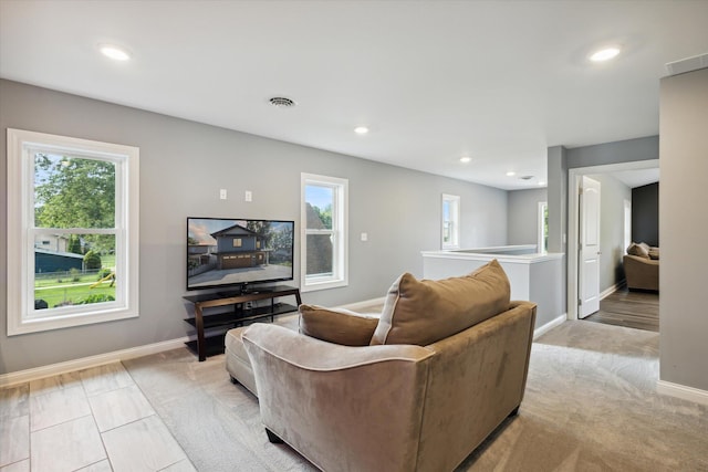 living room with a healthy amount of sunlight