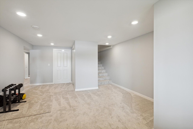 basement with light colored carpet