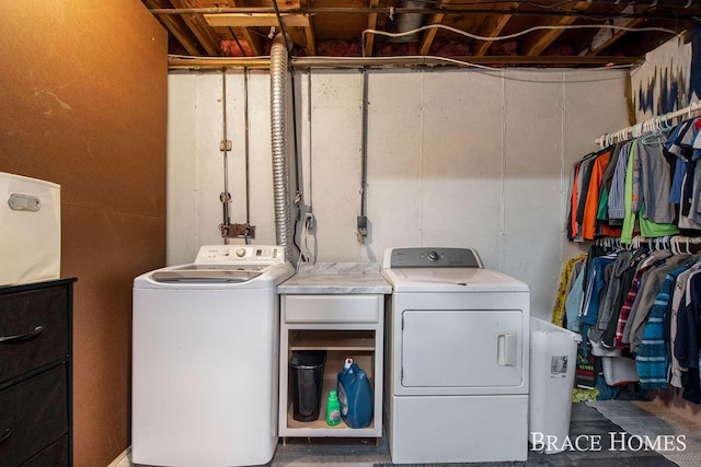 laundry room with washer and dryer