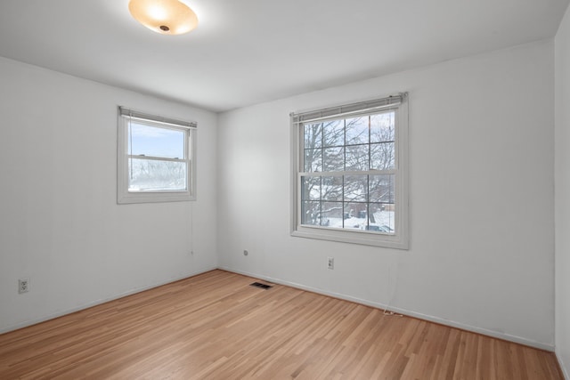 empty room featuring light hardwood / wood-style flooring