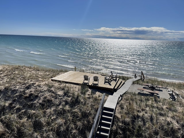 property view of water featuring a dock