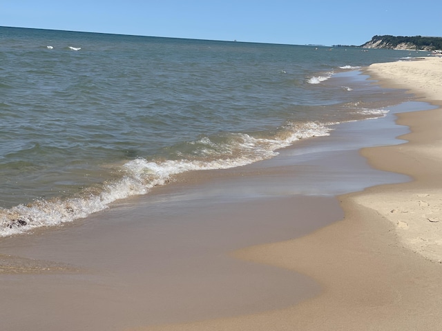 property view of water featuring a view of the beach