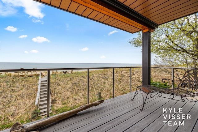7042 S Montgomery, Pentwater, MI 49449 - wooden deck featuring a water view