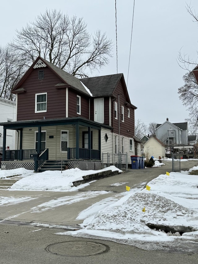 view of front property featuring covered porch