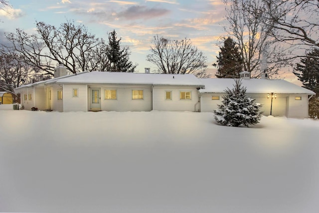 view of front of property featuring a garage