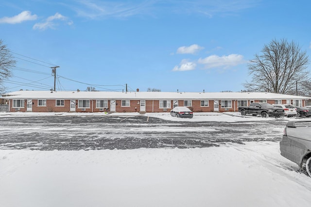 view of snow covered property