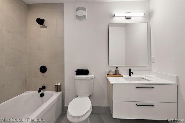 full bathroom featuring vanity, toilet, bathtub / shower combination, and baseboards