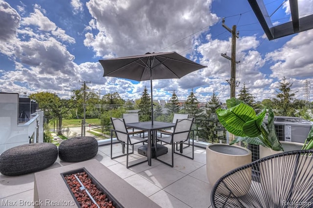 view of patio featuring outdoor dining space