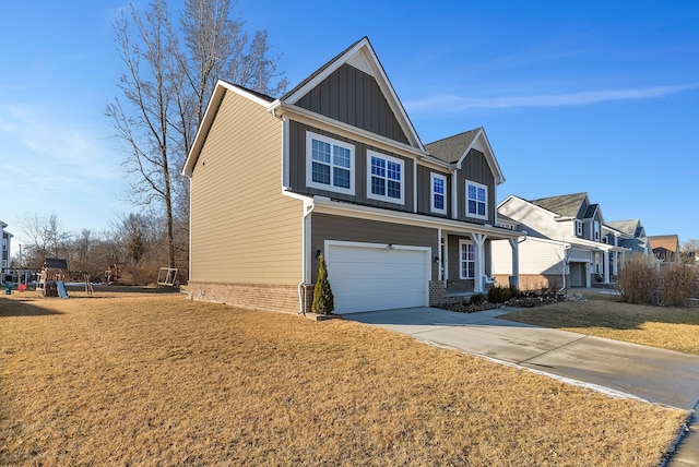 view of front of house featuring brick siding, concrete driveway, an attached garage, board and batten siding, and a front yard