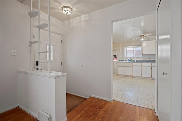 hallway featuring hardwood / wood-style flooring