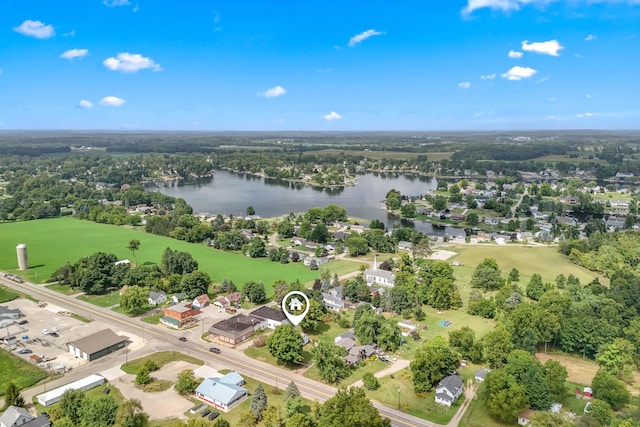 birds eye view of property featuring a water view
