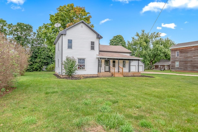 view of front of house featuring a porch and a front lawn