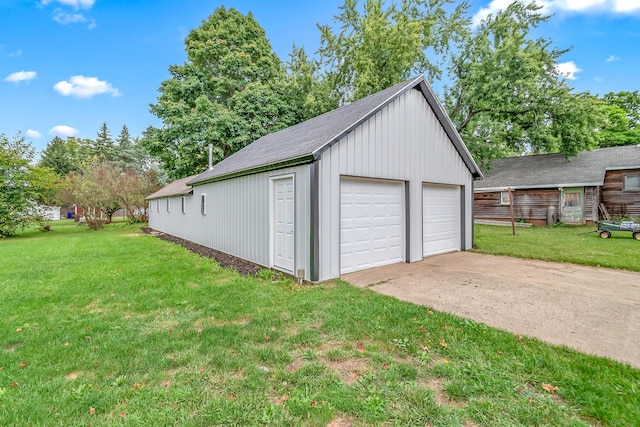 garage with a yard