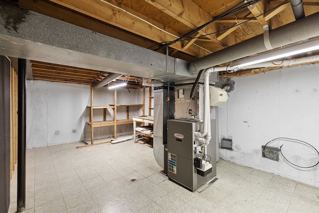 basement featuring heating unit