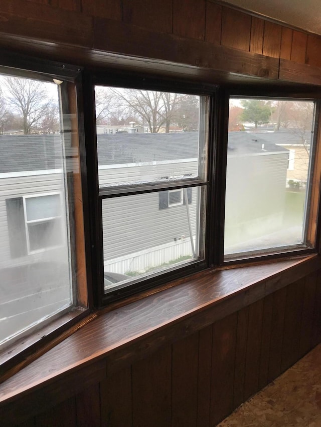 room details featuring wooden walls