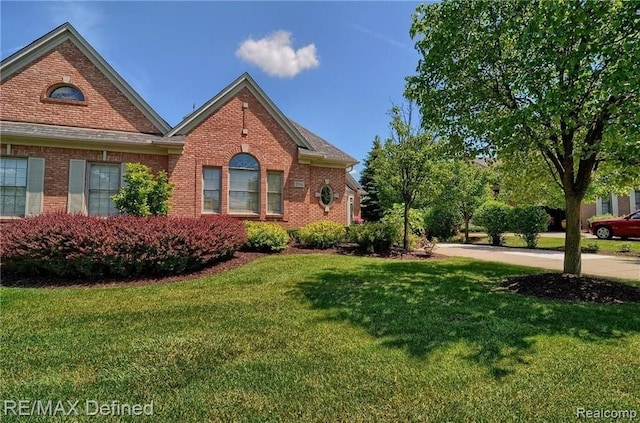 view of home's exterior featuring a lawn