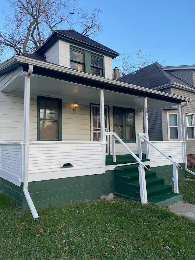 bungalow-style home with covered porch