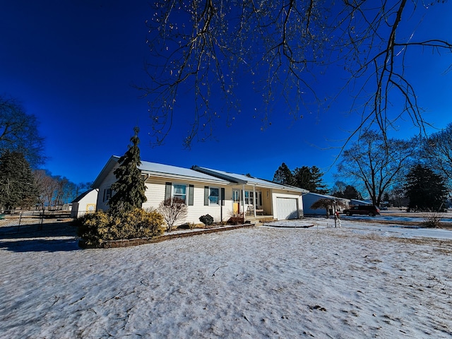 single story home with a garage