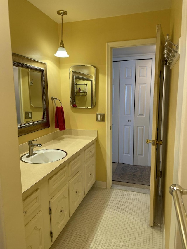 bathroom with vanity and tile patterned floors