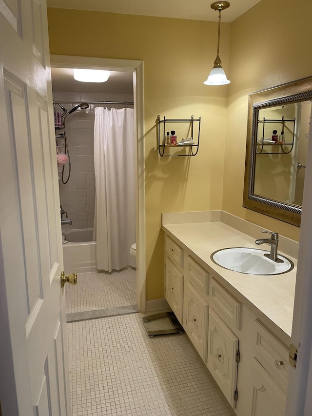 full bathroom featuring toilet, tile patterned flooring, shower / bath combo, and vanity