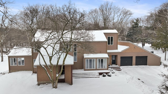 view of front of property featuring an attached garage