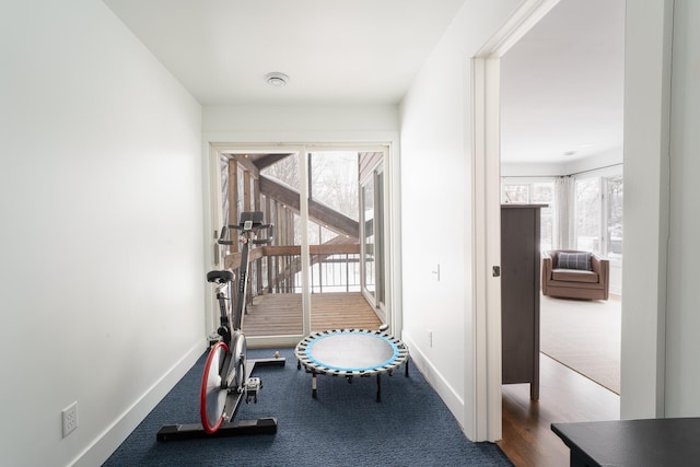 exercise area with baseboards