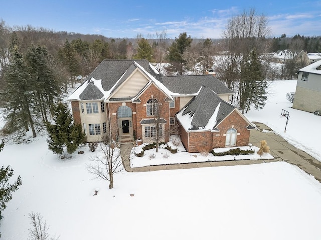 view of front of house featuring brick siding