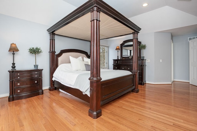 bedroom featuring lofted ceiling, recessed lighting, visible vents, light wood-style flooring, and baseboards