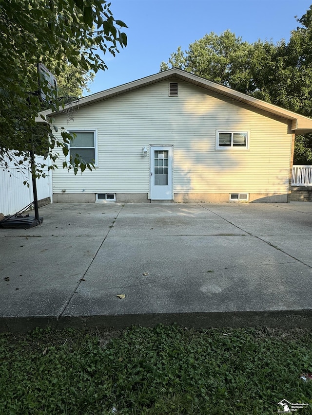 back of house with a patio area