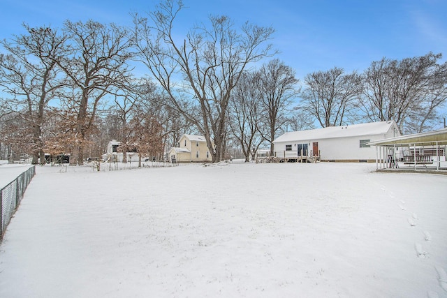 view of yard covered in snow