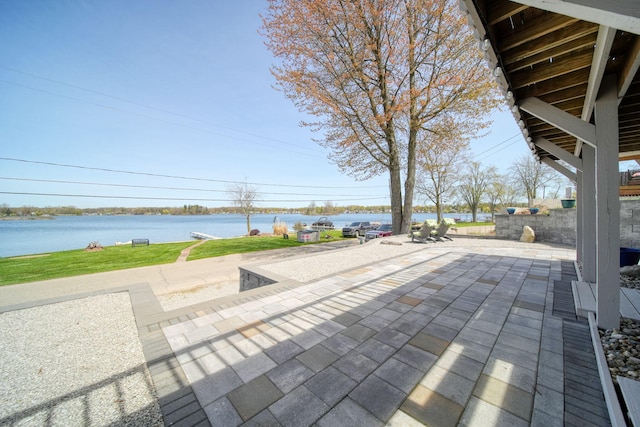 view of patio / terrace featuring a water view