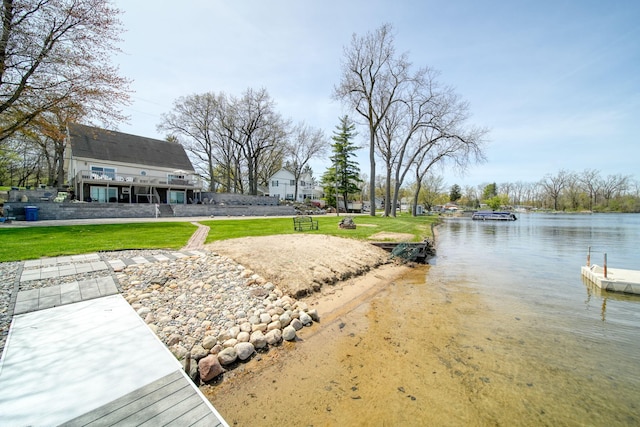 exterior space with a water view