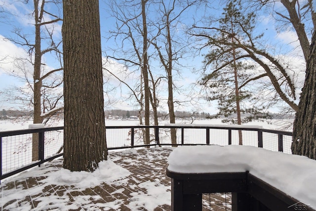 view of snow covered deck